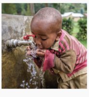 Alex Skolnick strings bring clean water comfort doll project